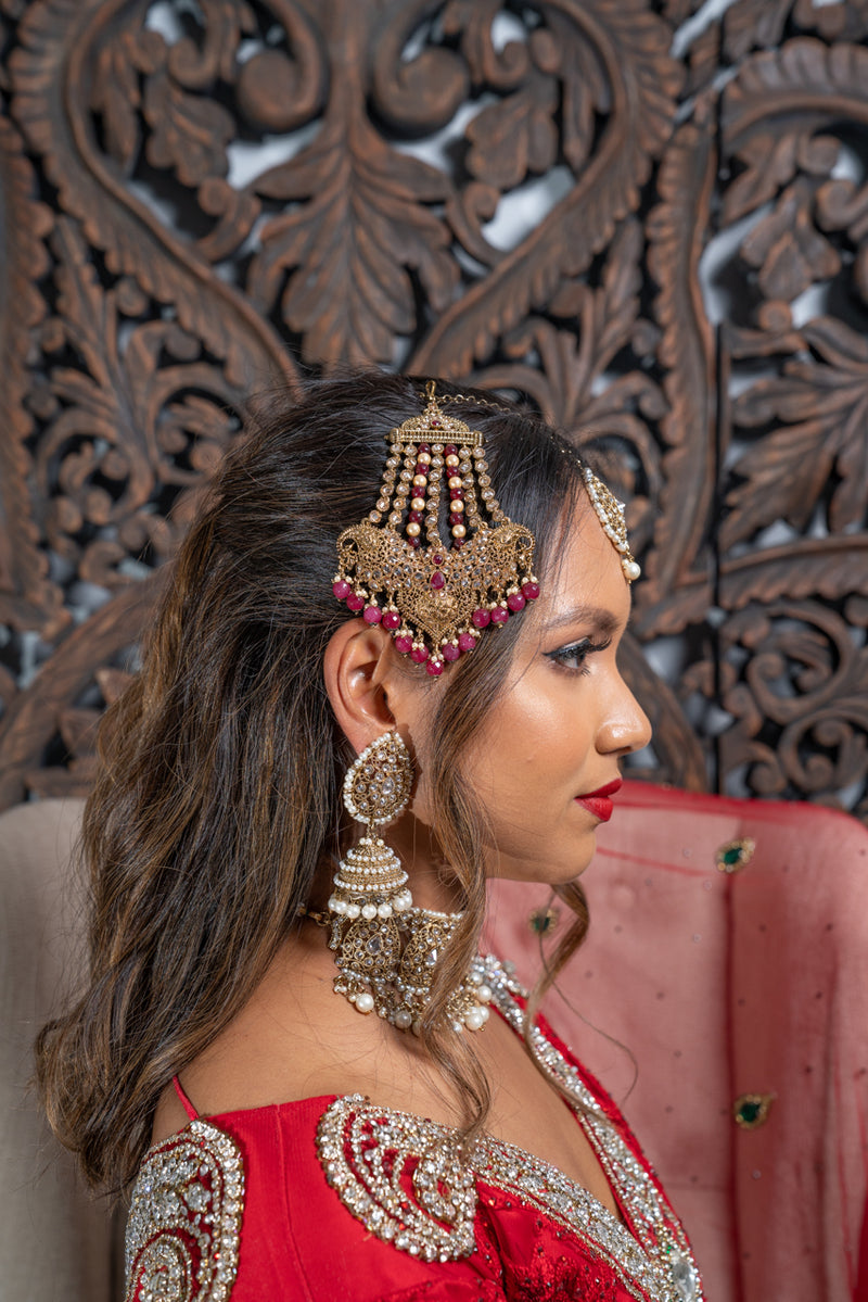 Regal Traditional Style gold jhoomar with Magenta Beads