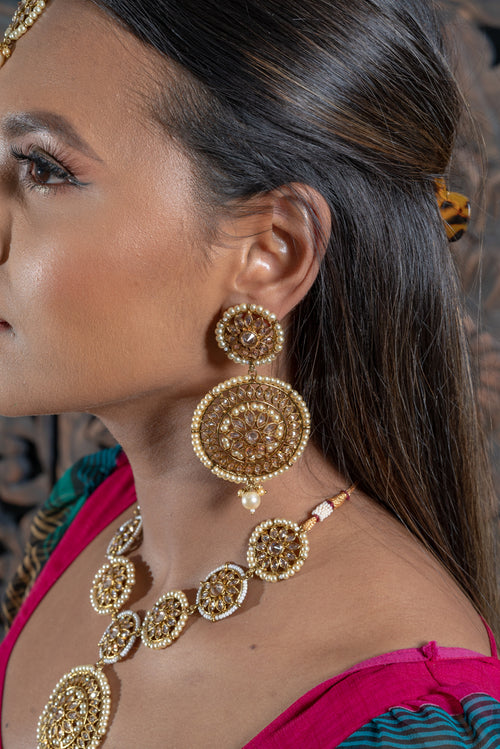 || COROZON || Rounded Gold Indian Choker with Earrings & Tikka in Champagne Pearls