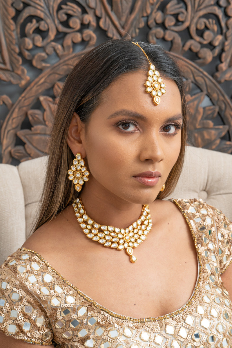 || RIRI || Yellow Gold Kundan Necklace with Earrings & Tikka Set