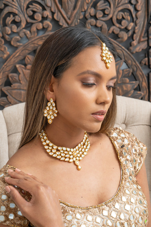 || RIRI || Yellow Gold Kundan Necklace with Earrings & Tikka Set