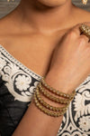 4 Gold Indian Bangles with Champagne Stones